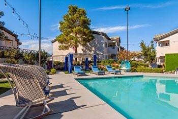 Lushly landscaped resort-inspired pool & spa with private cabanas